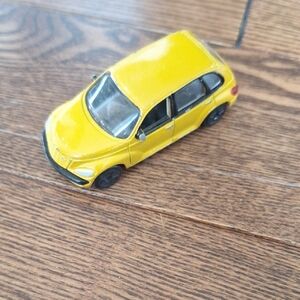 Yellow Toy Car Chrysler PT Cruiser